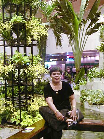 Rita in the orchid garden in the Singapore airport