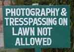 This sign on the Taj lawn is an example of ambiguous Indian English. Photography is allowed, but walking on the lawn is not - not even for picture taking