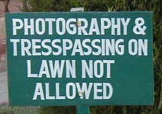 This sign on the Taj lawn is an example of ambiguous Indian English. Photography is allowed, but walking on the lawn is not - not even for picture taking
