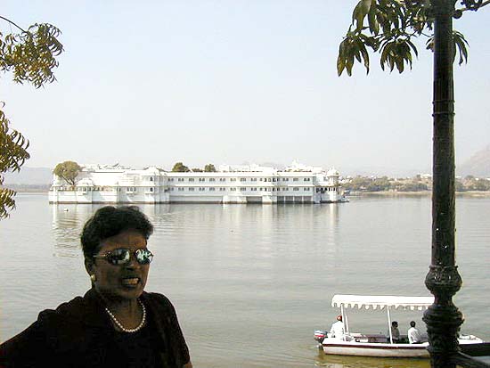 This is the Lake Palace Hotel, one of the best-known, and most expensive, hotels in India. It completely occupies an island in Lake Pachola.  The James Bond movie Octopussy included scenes from this hotel, from the Monsoon Palace above the city, and an autorickshaw chase through (simulated?) Udaipur streets.